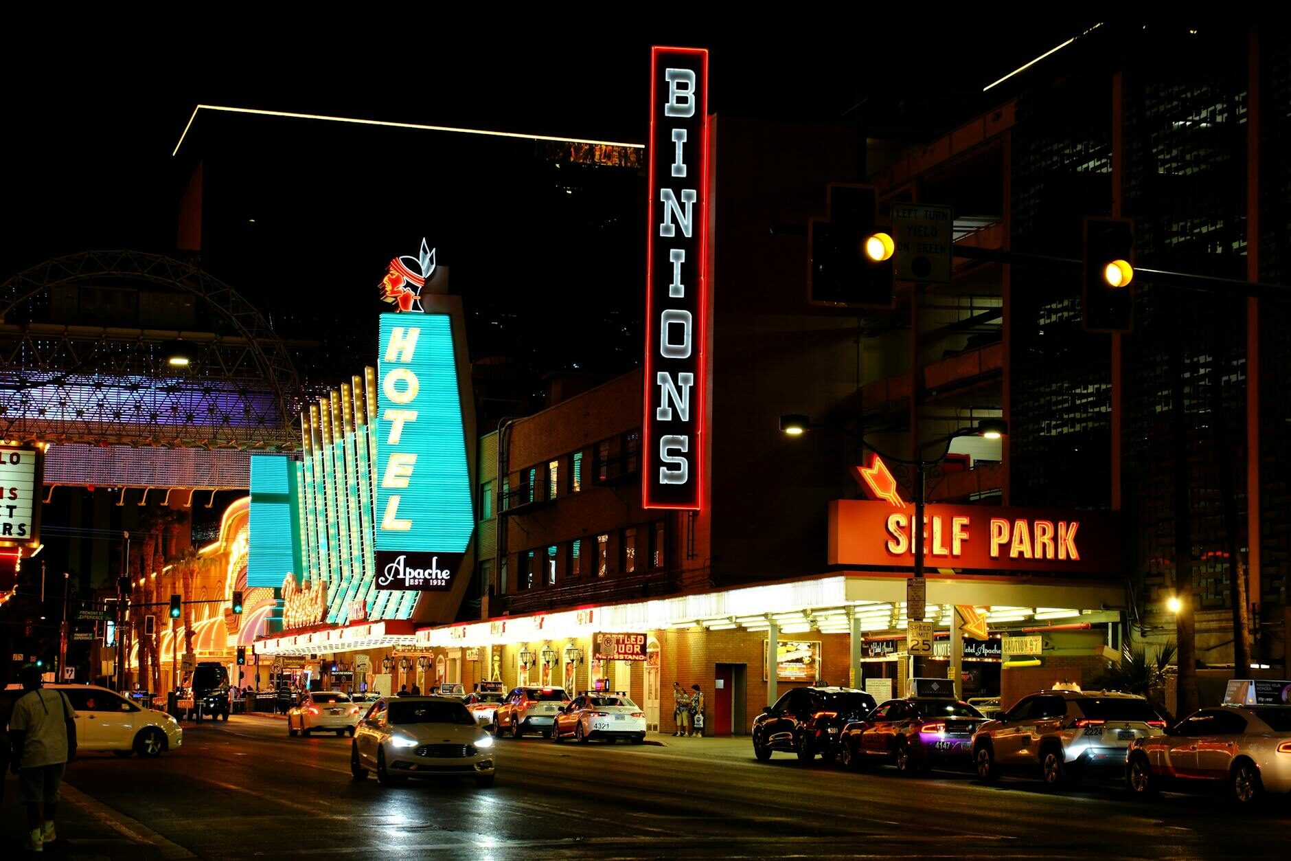 Red neon signs of Binion's on Fremont Street in Downtown Las Vegas at night